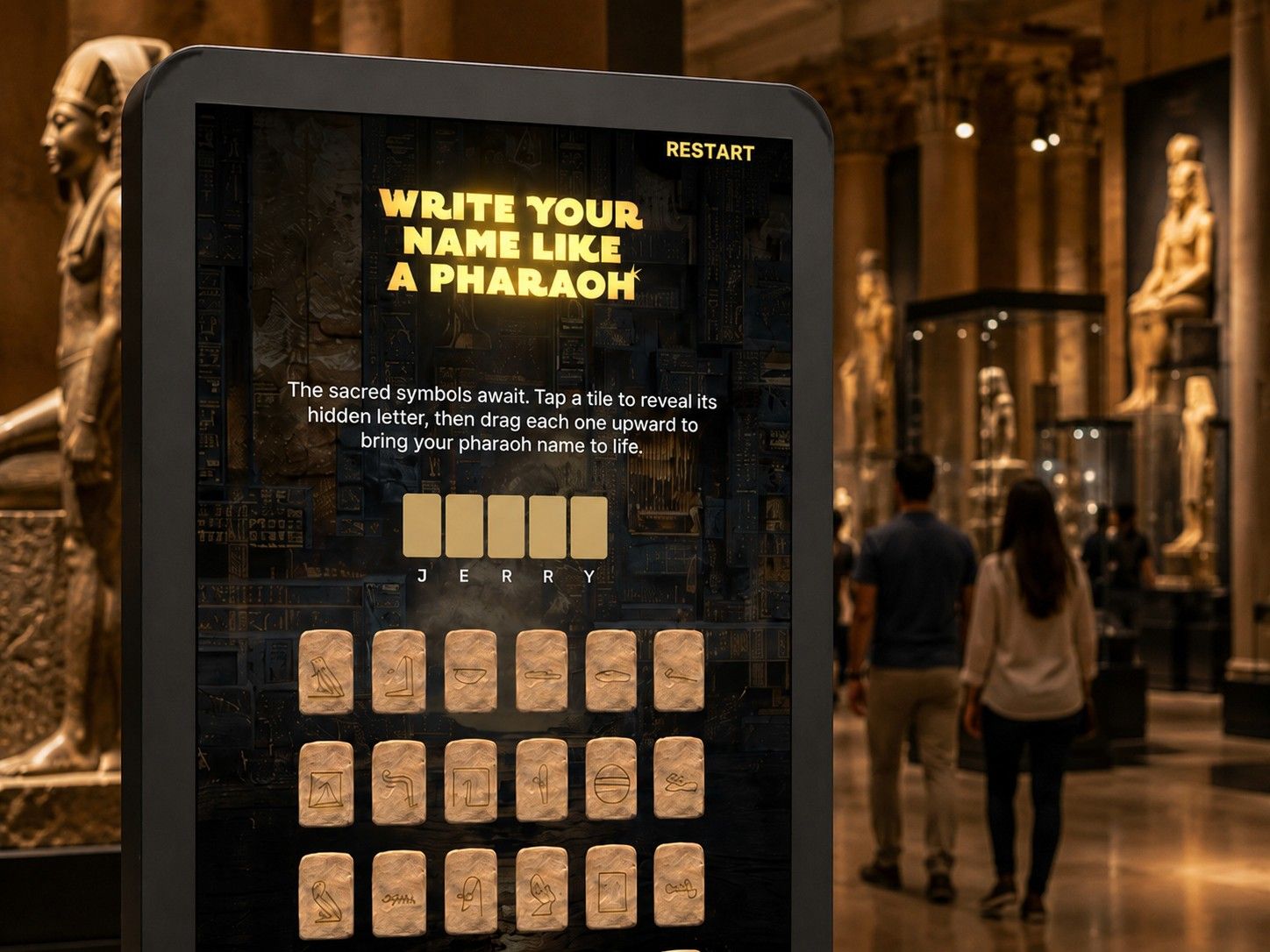 Close-up of the touchscreen interface showing the on-screen instruction and the carved hieroglyph tiles